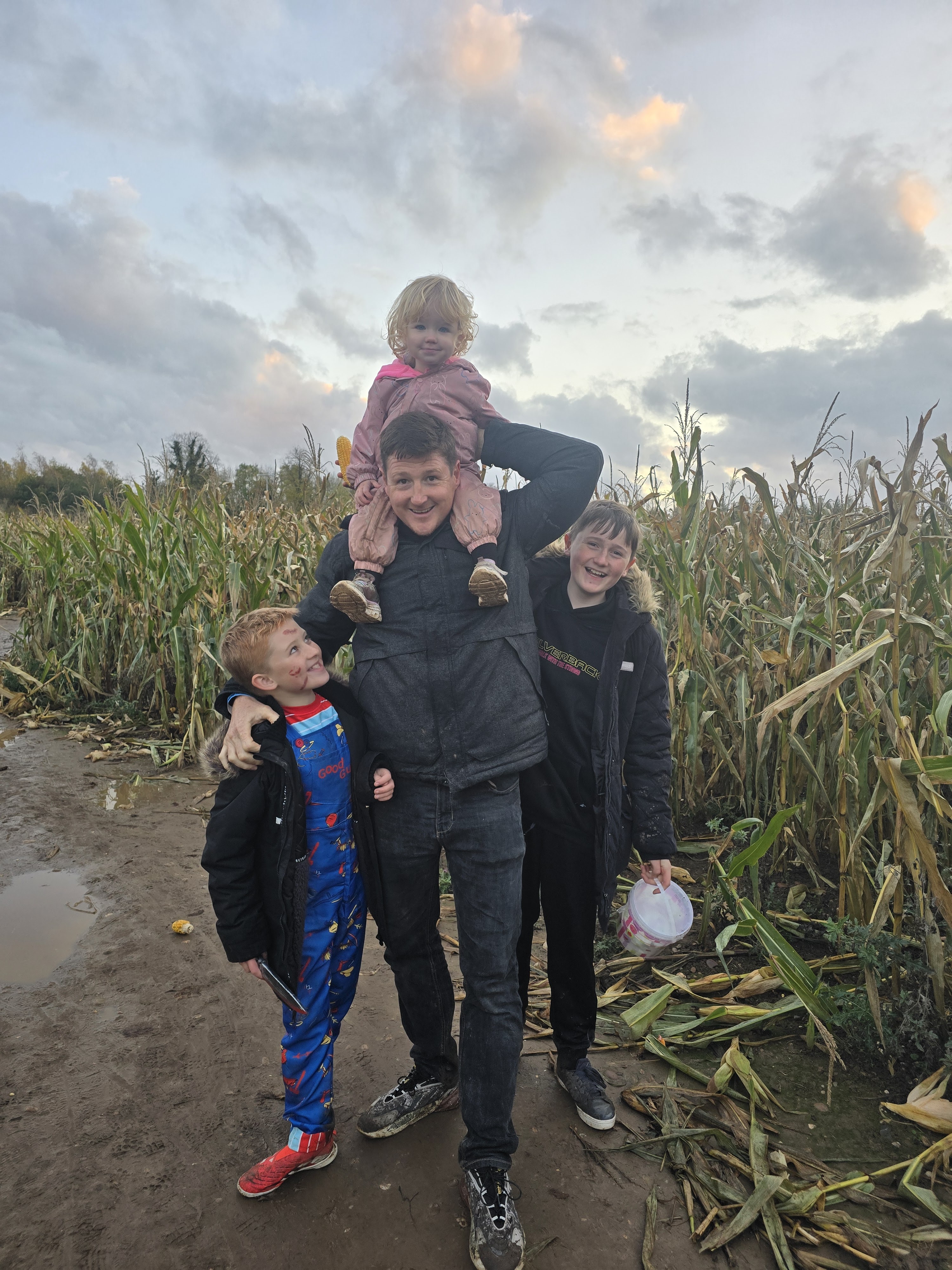 Family photo outdoors in a field