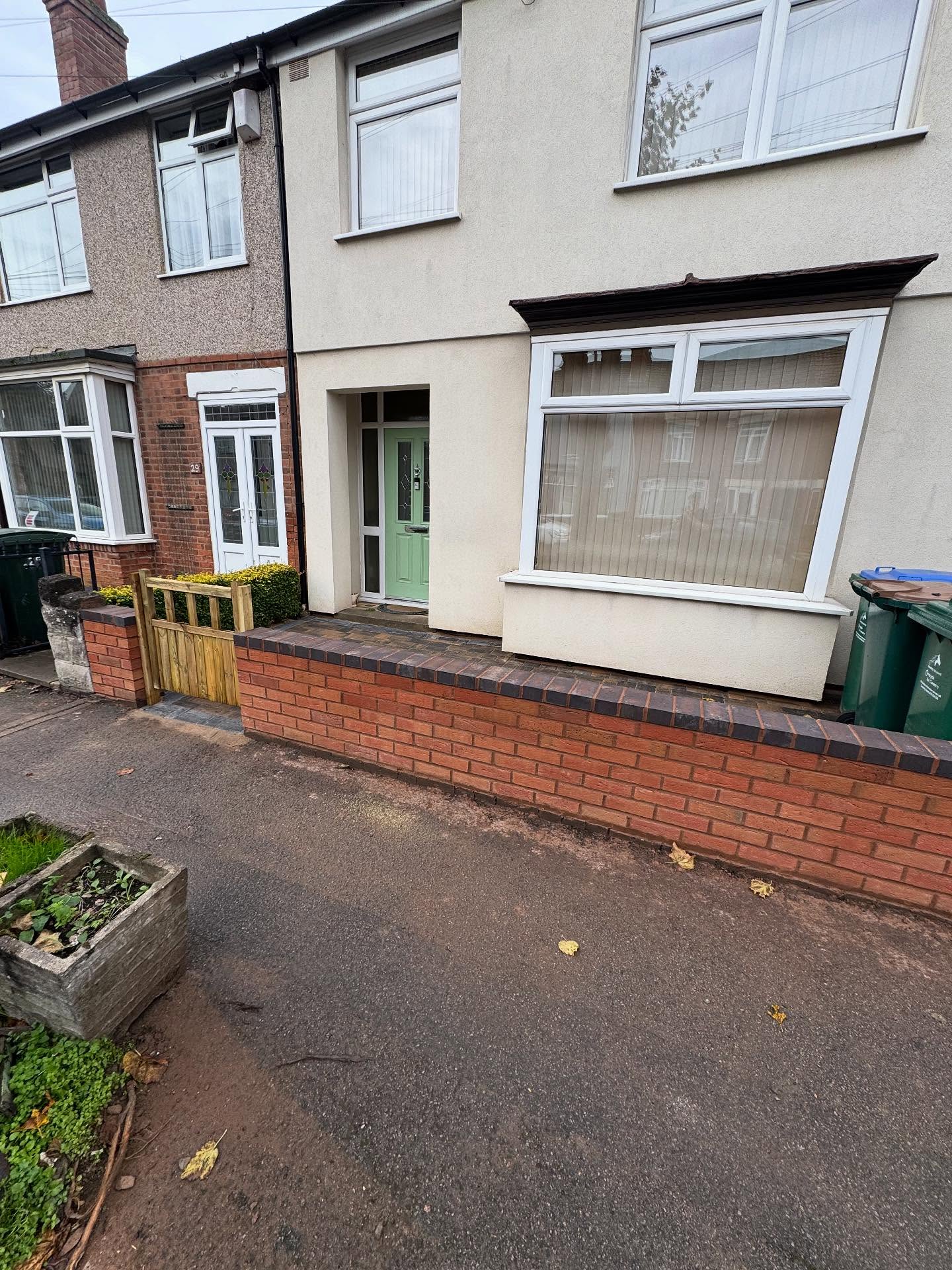 House, wall, cobbled front garden