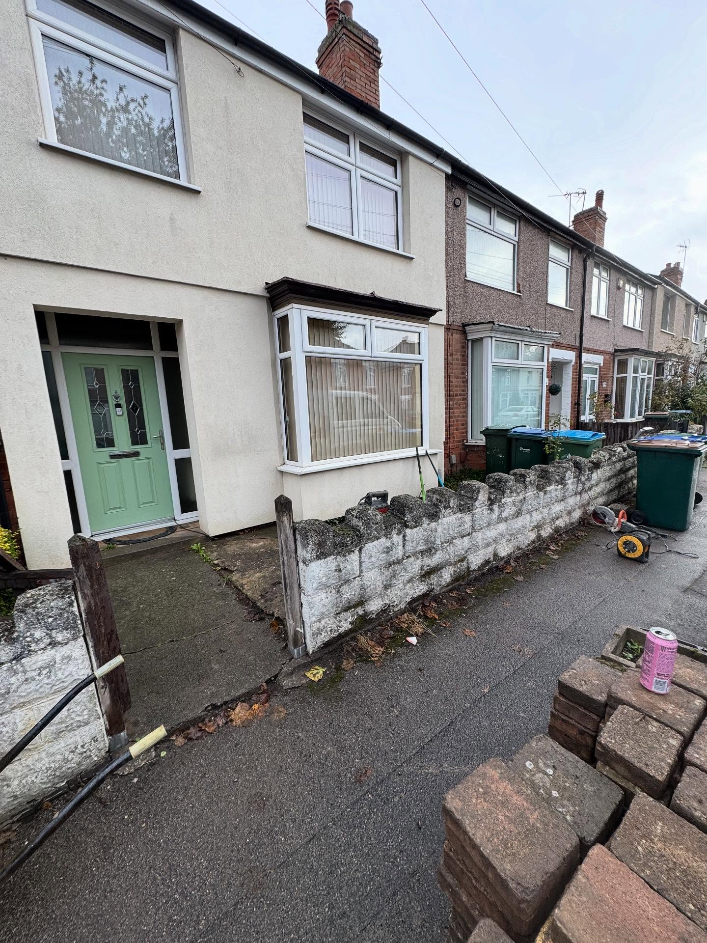 House, wall, cobbled front garden