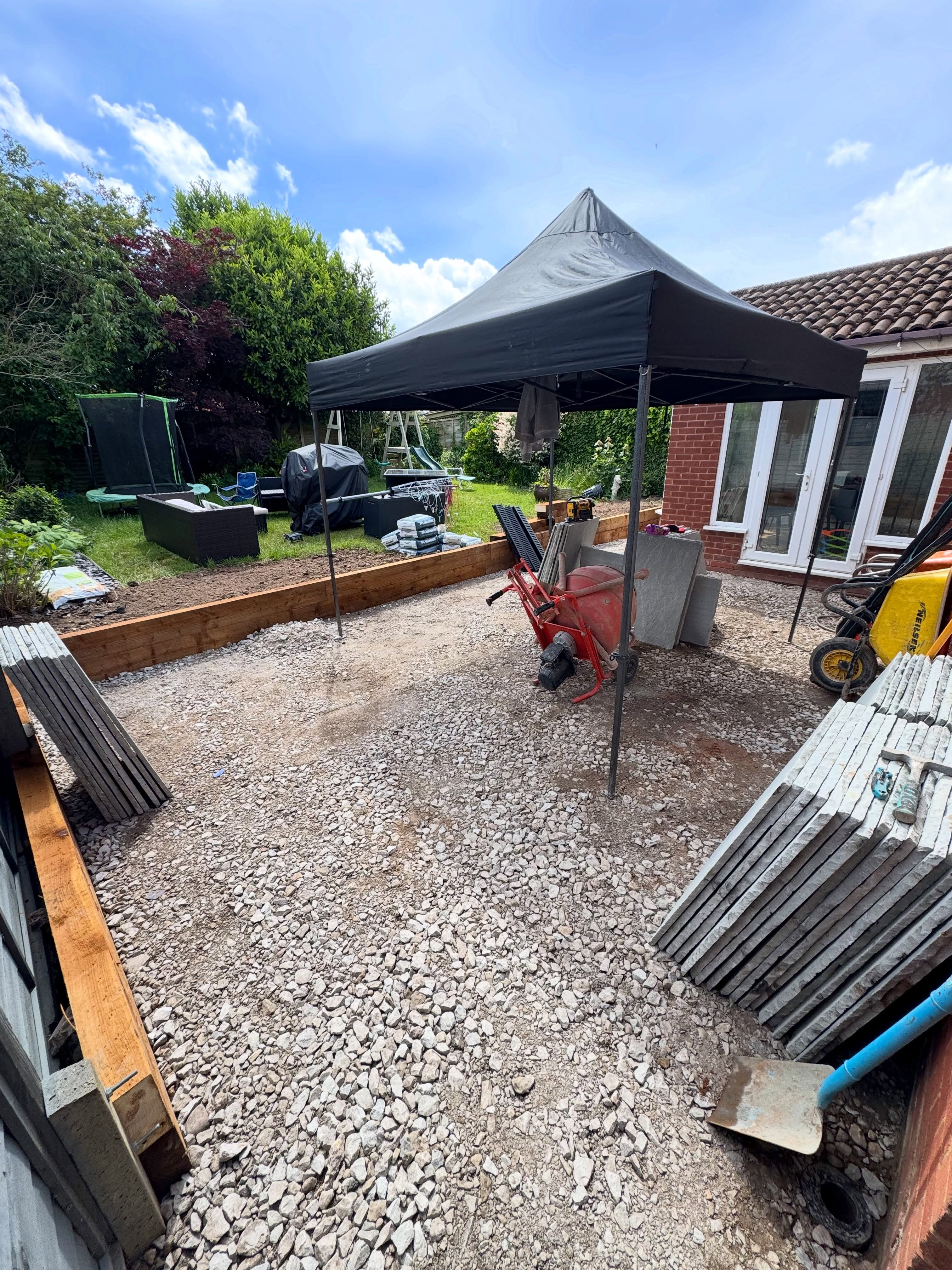 Garden, porcelain patio, grass, sleeper wall