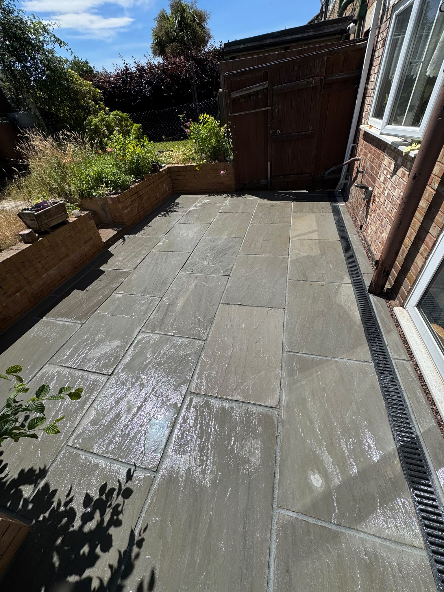 Patio area, drainage and grass